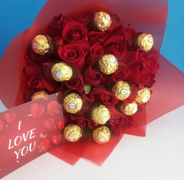 Red roses with chocolates